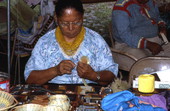 Alice Osceola sewing thread into grass baskets - White Springs, Florida