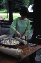 Thelma Driver cutting into a swamp cabbage - Mayo, Florida.