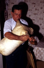 Nikitas Tsimouris playing a tsambouna - Tarpon Springs, Florida