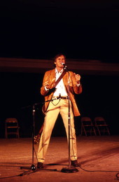 Gamble Rogers telling a story at the 1985 Florida Folk Festival - White Springs, Florida