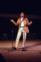 Gamble Rogers telling a story at the 1985 Florida Folk Festival - White Springs, Florida