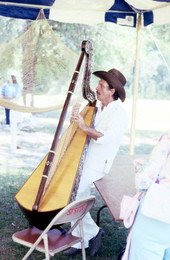 Jesus Rodriguez playing a Venezuelan harp at the Florida Folk Festival - White Springs, Florida