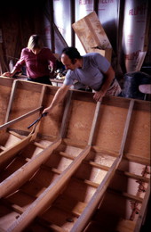 Bobby Shiver explains details of skiff to Nancy Nusz - Eastpoint, Florida