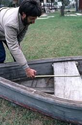 David Taylor measuring the thwart width of a 12 foot "dinky" - Eastpoint, Florida