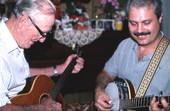 Jack Piccalo playing banjo and Richard Seaman playing guitar - Jacksonville, Florida.