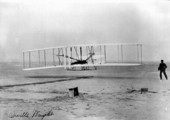 Photocopy of a photograph showing the Wright Brothers' first flight in Kitty Hawk, North Carolina.