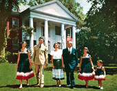 Governor LeRoy Collins and his family walking in front of "The Grove" - Tallahassee, Florida.