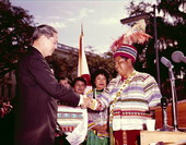 Billy Osceola, Chairman of the Seminole Tribe of Florida, presenting Governor Burns with a Seminole jacket at inaugural ceremony - Tallahassee, Florida.