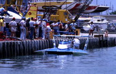 Atlas Van Lines hydroplane being hoisted by crane in Miami.