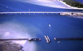 Aerial view looking west over fishing pier and Highway 771 at Gasparilla Pass near Placida.