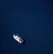 Aerial view showing a fishing boat off the southeast coast of Florida.