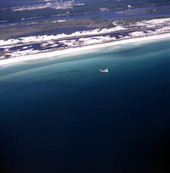 Aerial view showing a fishing boat near Santa Rosa Island, Florida.