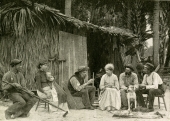 "Captain" Mansfield, center, telling a tale of the Seminole War at his home near Lake Monroe.