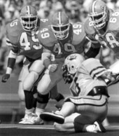 Quarterback Shaun Shehan takes on University of Florida's defensive line - Gainesville, Florida.