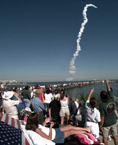 Crowds watching the launch of Space Shuttle Discovery