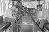 Basketball team from Illinois riding on a glass bottom boat during their visit to Paradise Park.
