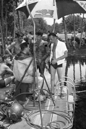 Director Jack Arnold, right, and Ricou Browning with divers on the set of "Revenge of the Creature" movie.