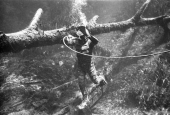 Ricou Browning breathing through air hose between takes of the "Revenge of the Creature" movie at Silver Springs.