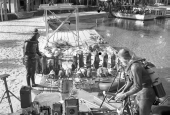 Scuba divers with underwater photography equipment and Silver Springs diving equipment.
