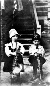 Reba Belle and Joel Mendelson with musical instruments