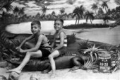 Stanley and Milton Weinkle sitting on a stuffed alligator - Miami Beach, Florida.