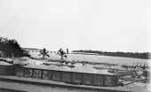 Damaged railroad cars after the 1926 hurricane - Lake Worth, Florida.