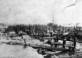 Charred remains of docks on the St. Johns River after the Fire of 1901 - Jacksonville, Florida