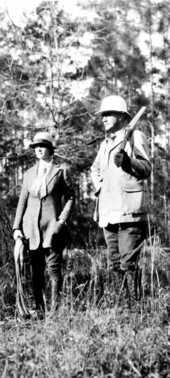 Col. and Mrs. Lloyd C. Griscom dressed for hunting