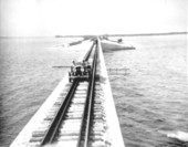 Automobile on its way via the overseas extension - Key West, Florida.