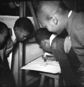 Children drawing at the Jacksonville Negro Art Center of the WPA Federal Art Project- Jacksonville, Florida.