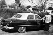 Seth Gaines and his taxi - Tallahassee, Florida.