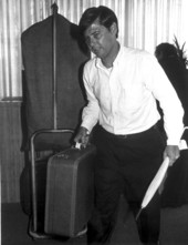 Florida State Senator Bob Graham during work day as a bellhop - Orlando, Florida.