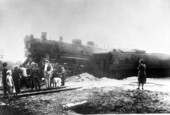 People stand near the train wreck - Lloyd, Florida.