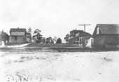 Avenue A with First Baptist Church and city hall..