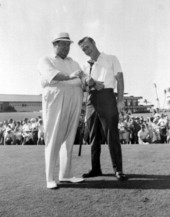 Jackie Gleason and Arnold Palmer at a golf match.