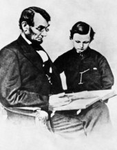 President Lincoln, with his son Tad.