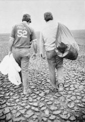 Governor Bob Graham and an aide collecting trash