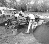 Workers searching for items left behind from the past