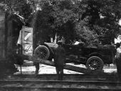 Car being loaded onto a train at De Leon Springs for a trip to Buffalo, New York