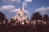 Groups of people on bridge in front of the castle - Walt Disney World, Florida.