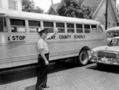 Clay County school bus and patrolman - Green Cove Springs, Florida.