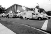 News service trucks in town during the 2000 presidential election vote dispute