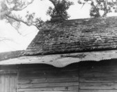 Close up of chimney and roof on the Wilson home