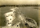 View showing work being done on the train track for the Gulf, Florida and Alabama Railway Company.