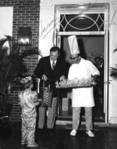 Jason Scott Turner receiving treats from Governor Claude Kirk during a Halloween party at the Governor's Mansion in Tallahassee, Florida.