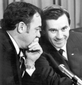 Florida Governor-elect Reubin Askew listens to Florida Governor Claude Kirk.