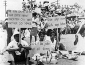 Florida teachers displaying protest signs during their walkout.