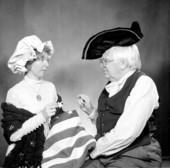 Joan and Allen Morris in revolutionary costume for one of their Christmas cards