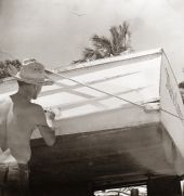 Fishing boat in dry dock being painted - Riviera Beach, Florida.