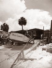 View of the Marie Lenore fishing boat being painted in the boatyard dry dock - Riviera Beach, Florida